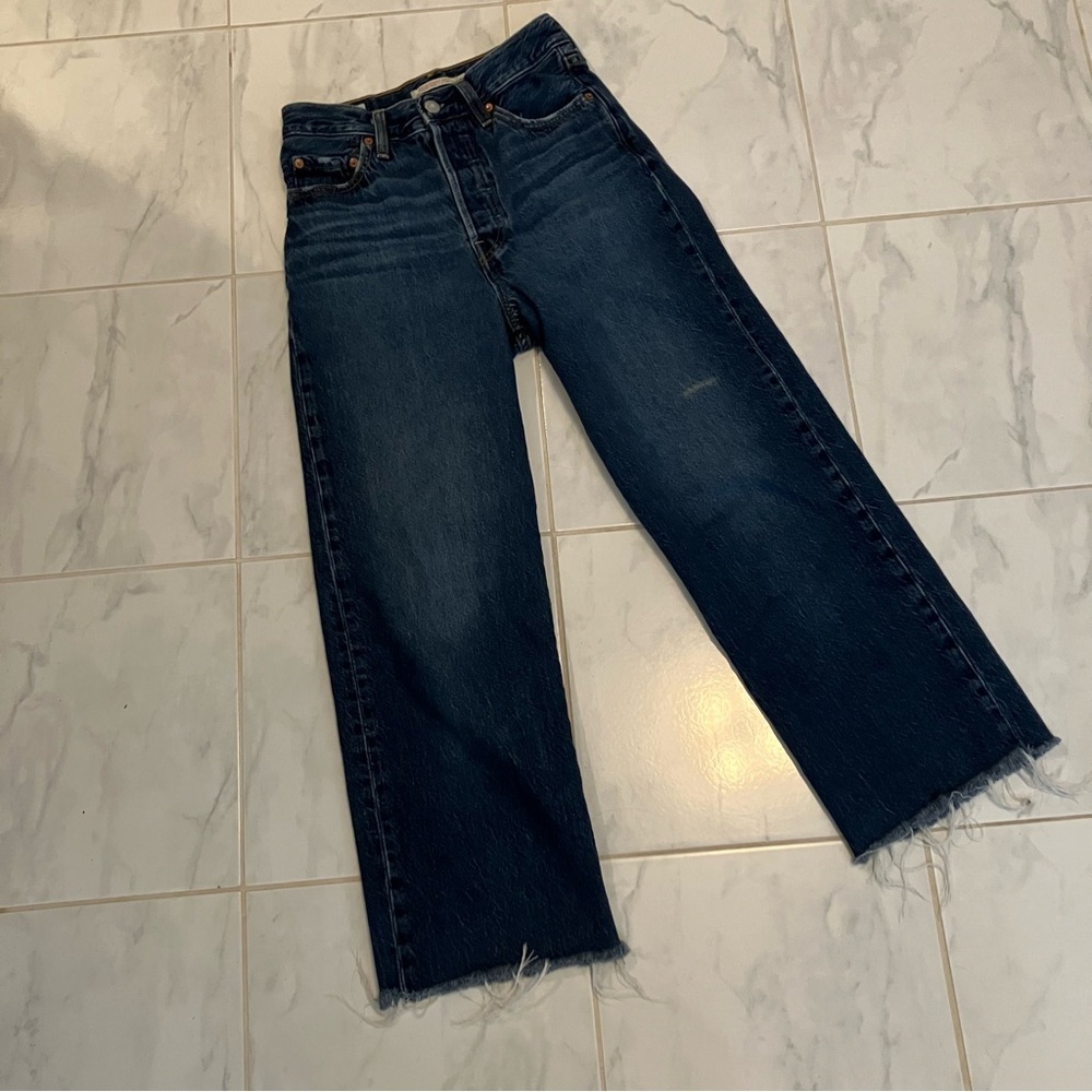 Levis red tab blue denim jeans. Premium style.  Raw hem.Some natural distressing